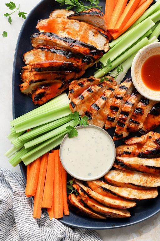 Buffalo Chicken Breast with Celery and Carrot Sticks